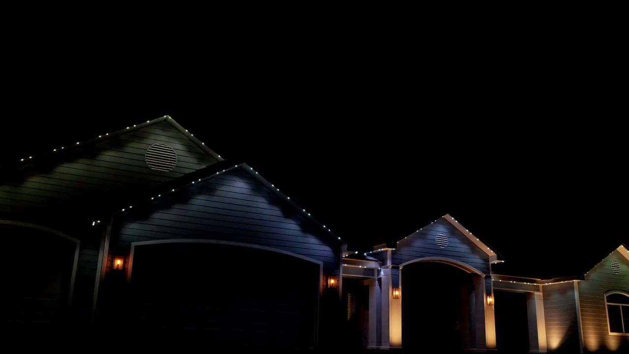 Home in the East Valley lit with UFO permanent lighting at night